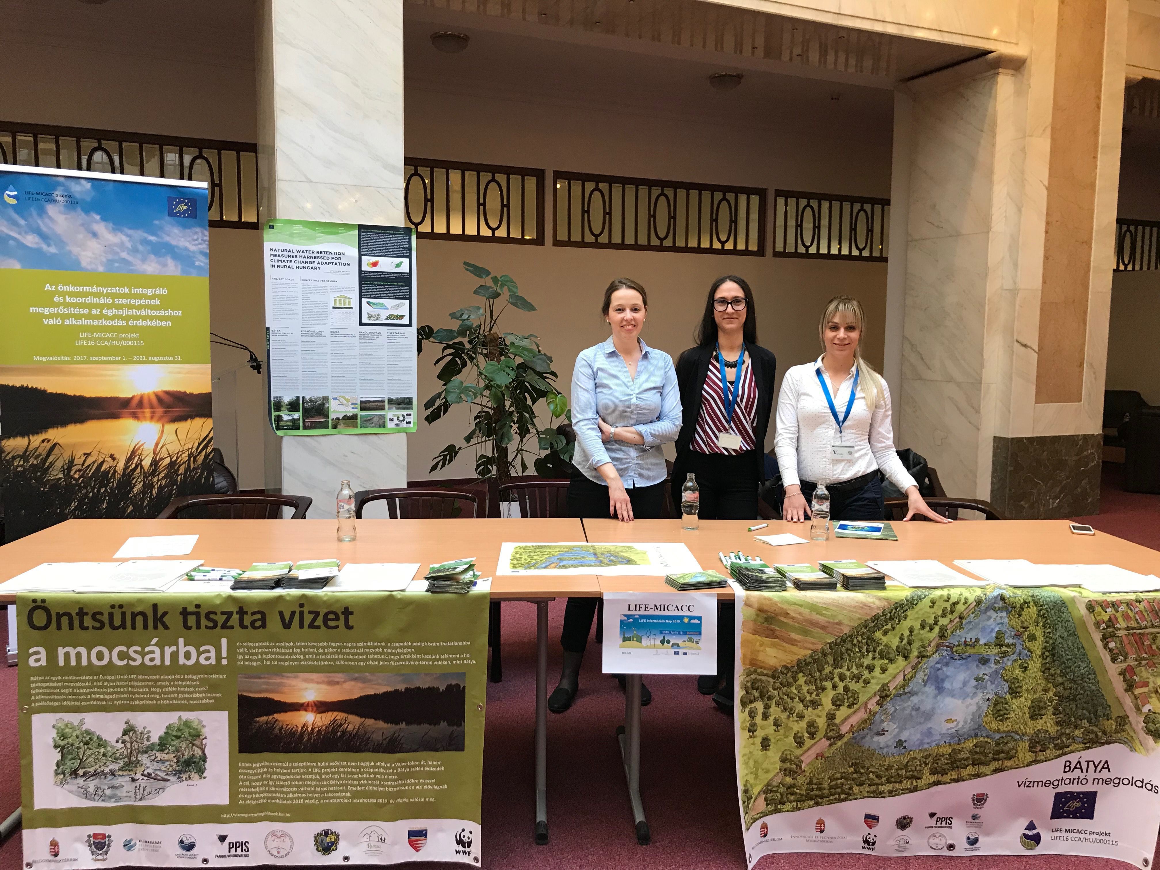 LIFE MICACC booth with Zsuzsanna Hercig (Ministry of Interior), Petra Szatzker (Ministry of Interior) and Zsófia Szabó (Municipality of Bátya)